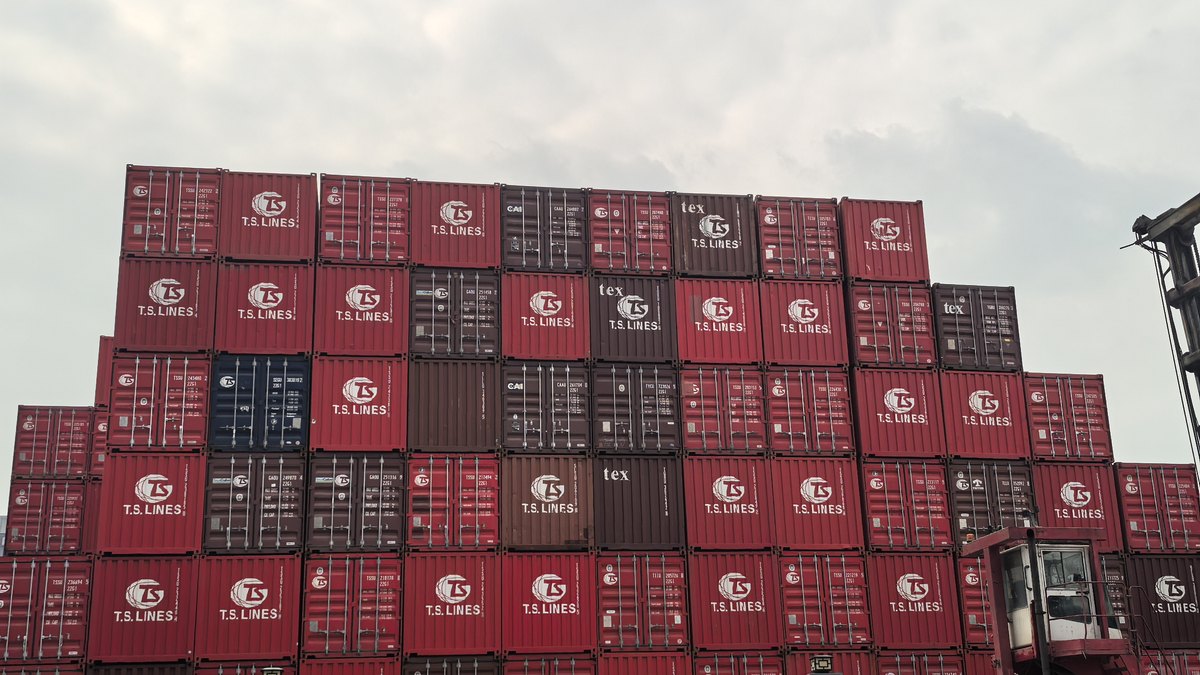 Rows of shipping containers stacked at a port terminal &mdash; Argentine imports move mainly through Buenos Aires