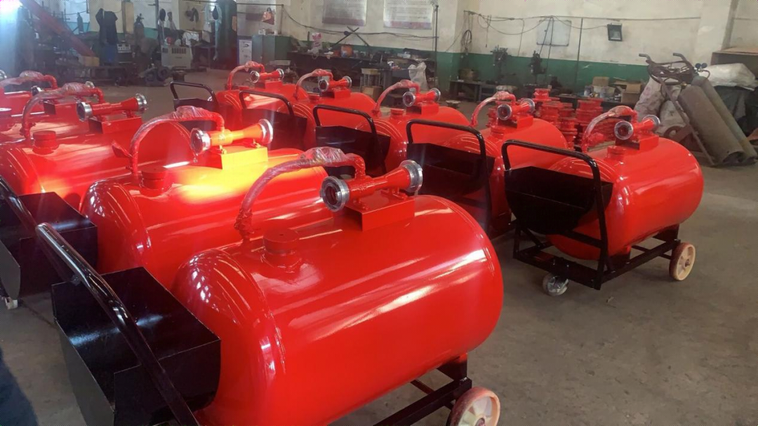 Forklift-handled fire extinguisher