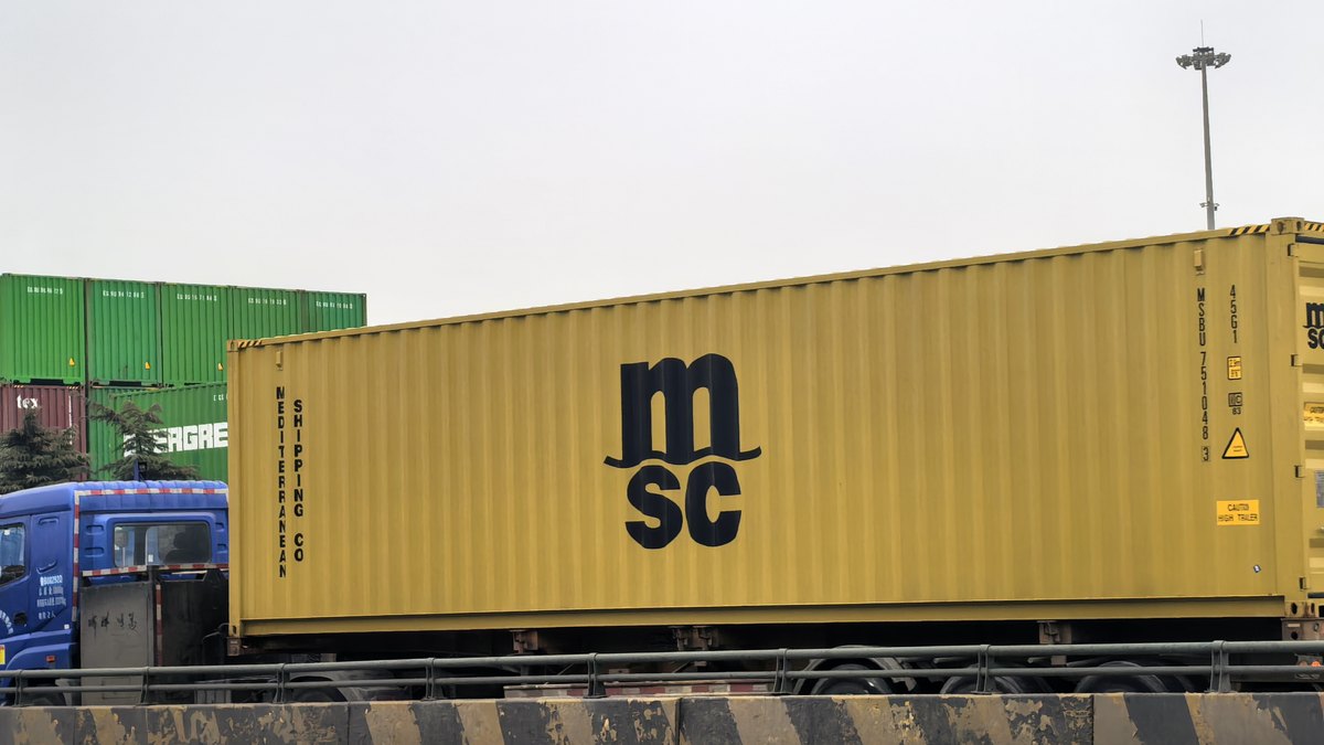 Evergreen container truck at Tianjin Port, China — dated FCL rate log for containers from China to Italy