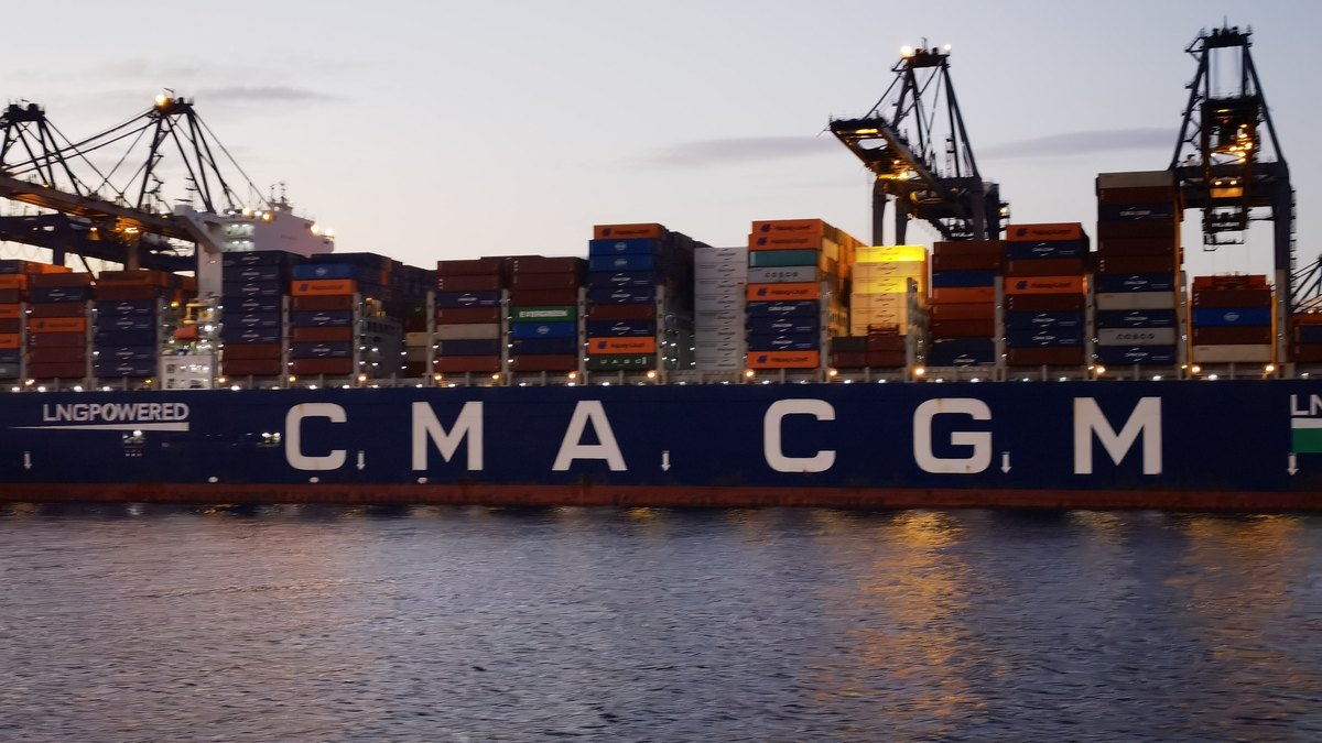 Container vessel berthed at a busy terminal &mdash; Mombasa plays this role for Kenya and its landlocked neighbours