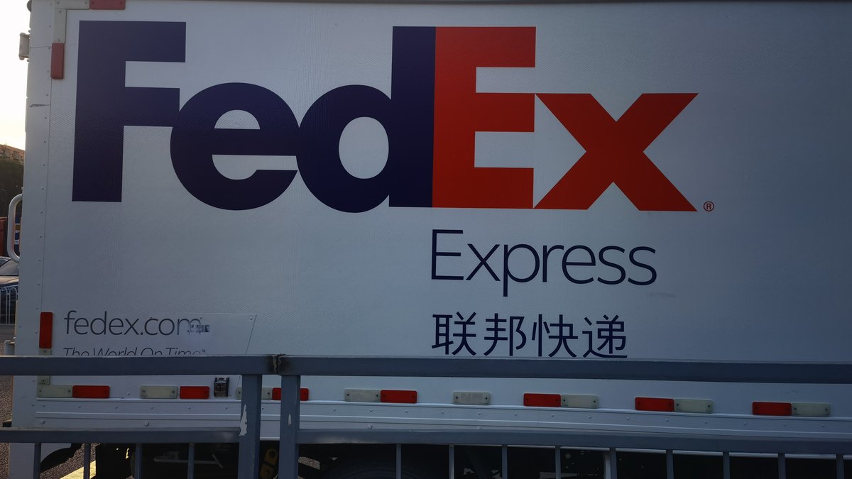 FedEx trailer loading international express shipments from China to Malaysia
