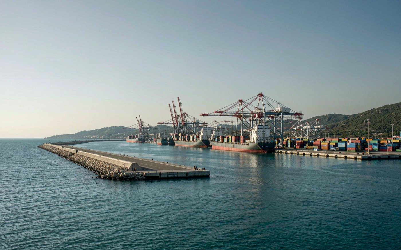 Container port of Durres, Albania, on the Adriatic Sea with cargo vessels and gantry cranes