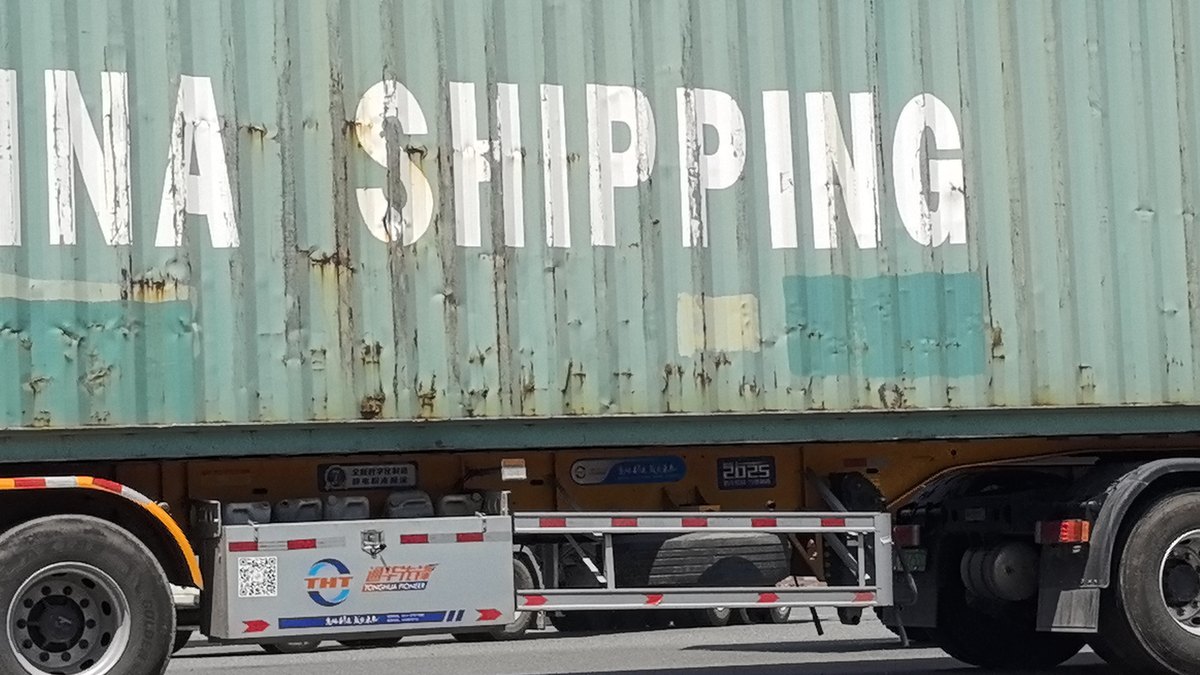 Container yard at Tianjin Port, China — dated FCL rate log for shipping containers from China to Canada