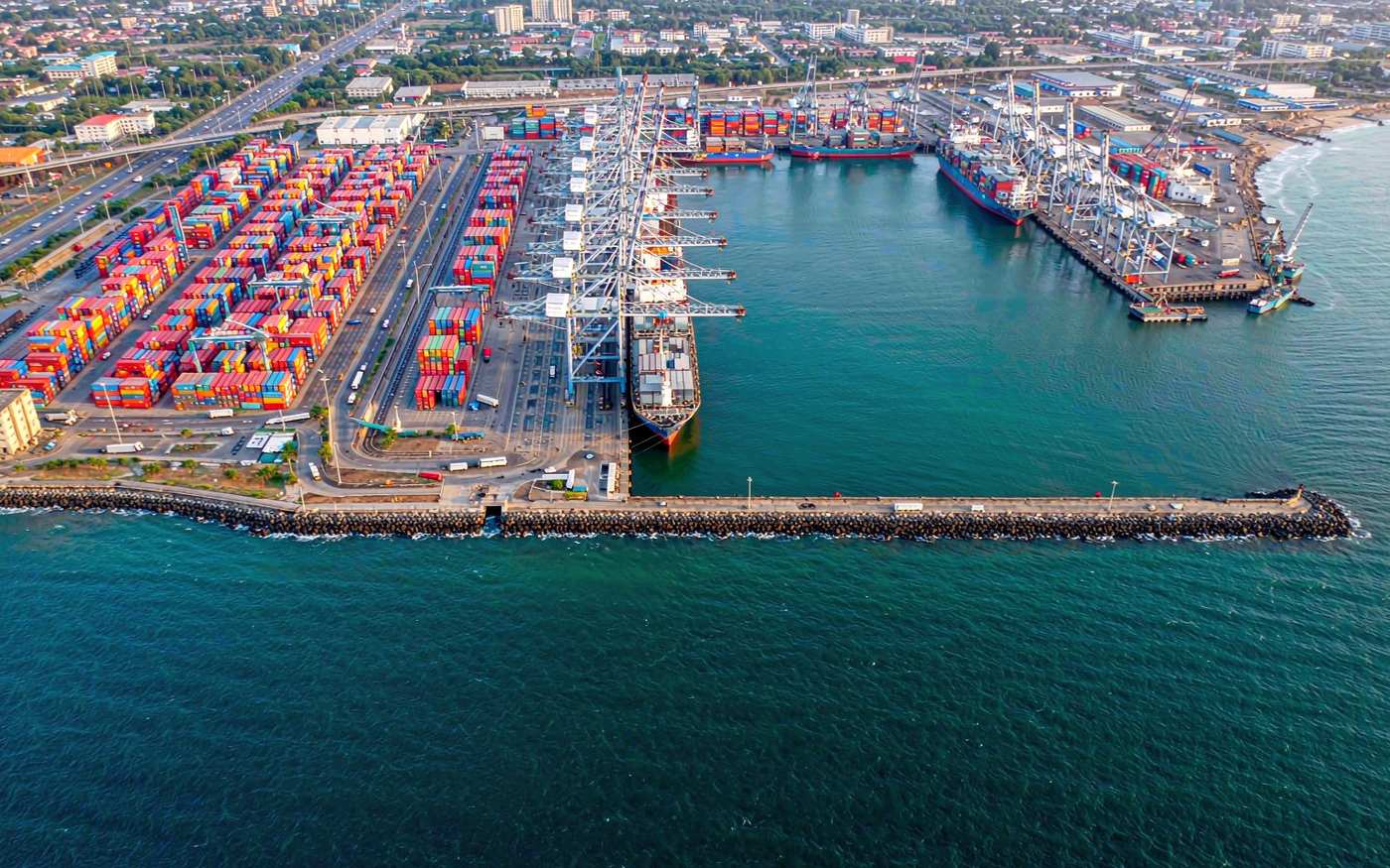 Aerial view of the Lomé Container Terminal at the Port of Lome, Togo, with container vessels and gantry cranes