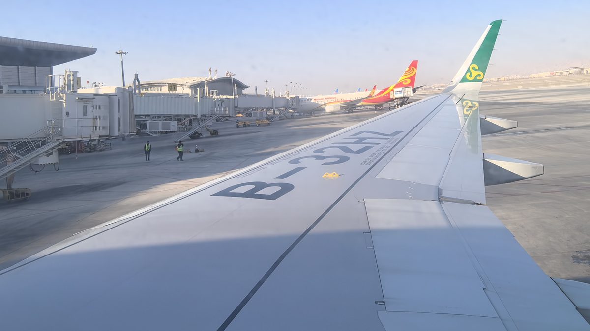 Aircraft parked on the cargo apron of a Chinese international airport &mdash; air freight from Shanghai Pudong to Los Angeles