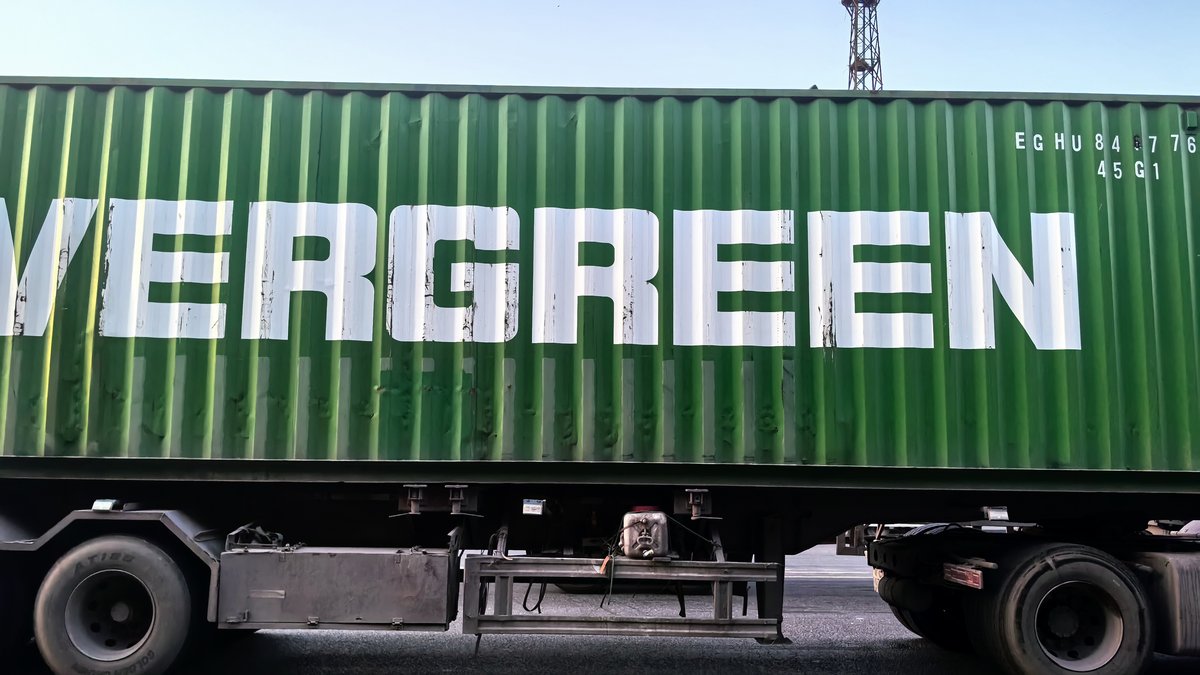 EVERGREEN container truck at Tianjin Port, China — current 20ft 40ft 40HQ sea freight from China to Spain