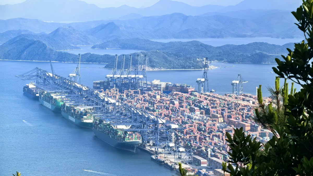 Container ships worked at a deep-water port &mdash; the ocean leg before inland delivery to Kampala, Uganda