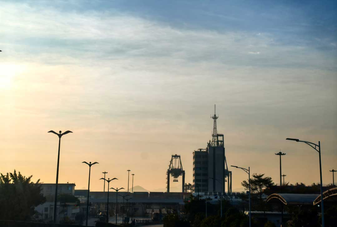 gantry crane silhouette at dusk